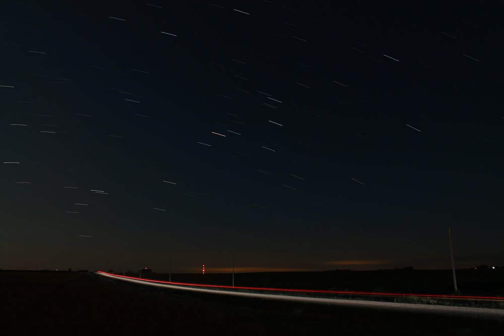 A time-lapse, star-trail photo of Scorpius