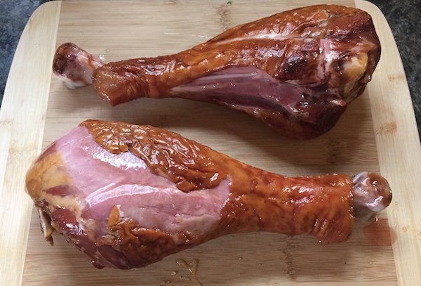 A pair of smoked turkey drumsticks purchased from the grocery store